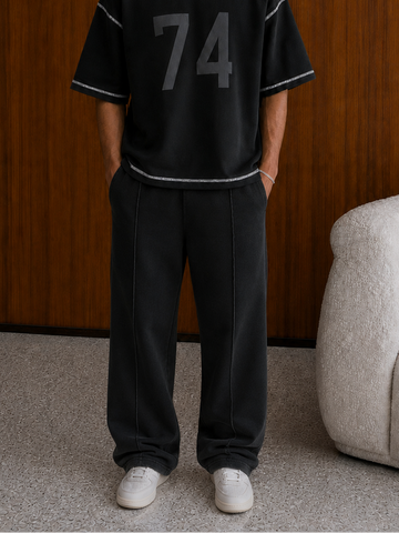 BLACK ESSENTIAL WIDE-LEG PLEATED SWEATPANT