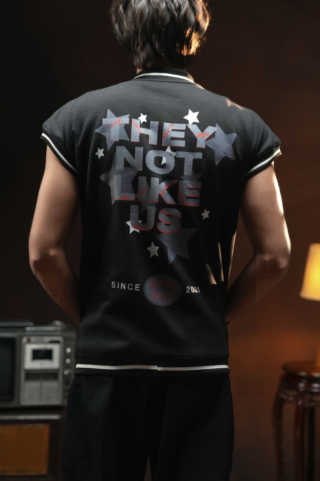 REBEL CODE SLEEVELESS VARSITY JACKET